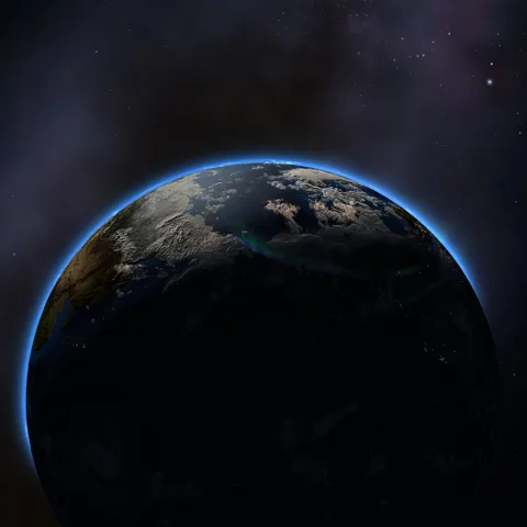 Earth from space with the Moon's shadow on it